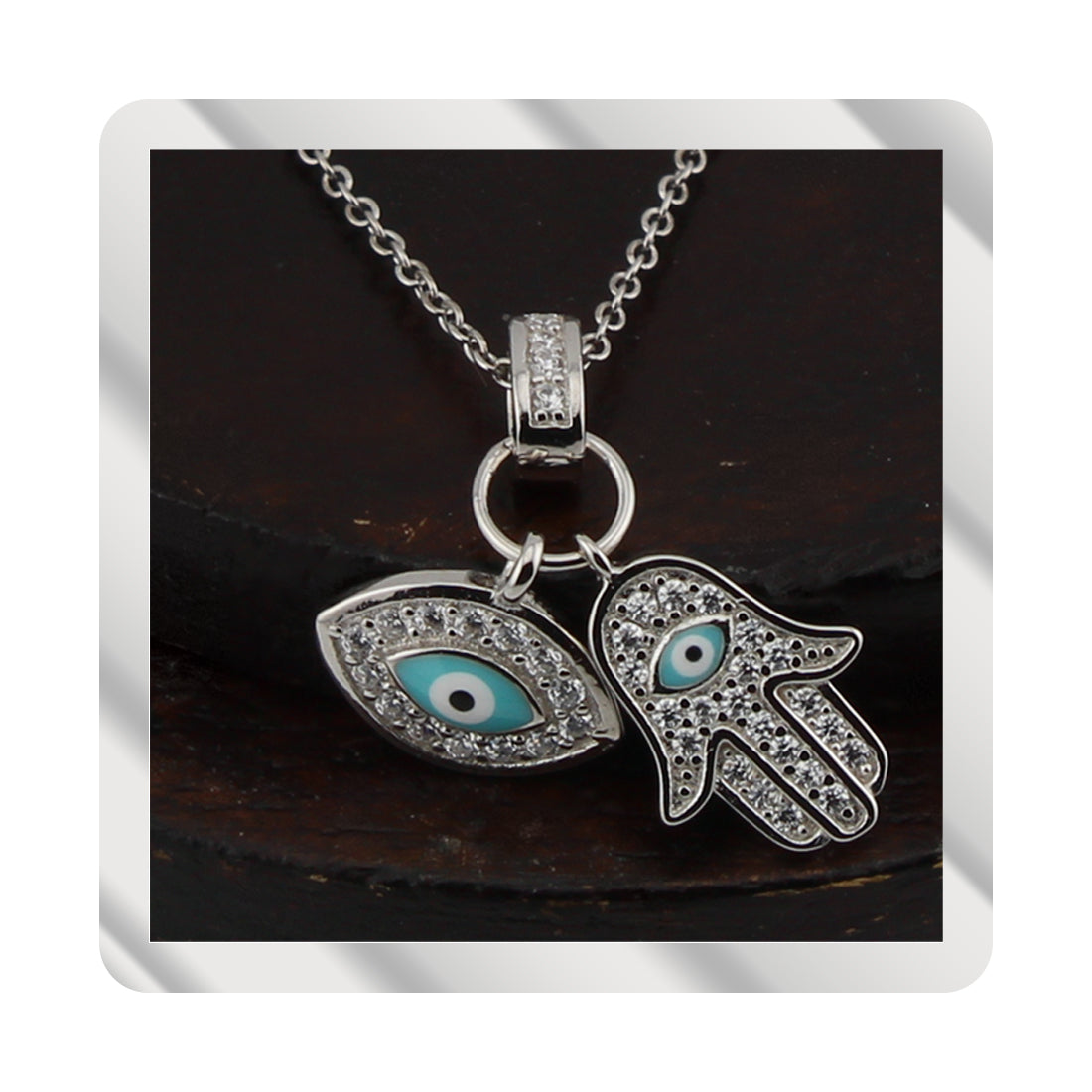 Collar con Colgante Mano de Fátima y Ojo Turco. Plata de Ley. Baño Rodio. Zirconitas. Cadena Forzatina CL1314799R - Henor