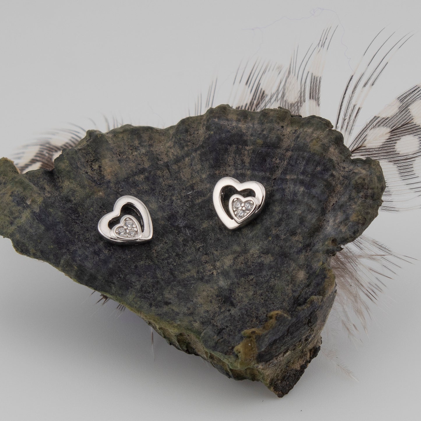 Pendientes doble corazón En fina Plata de Ley S925 con Baño Rodio y Zirconita PD2316473R - Henor