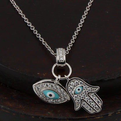 Collar con Colgante Mano de Fátima y Ojo Turco. Plata de Ley.  Baño Rodio. Zirconitas. Cadena Forzatina CL1314799R - Henor