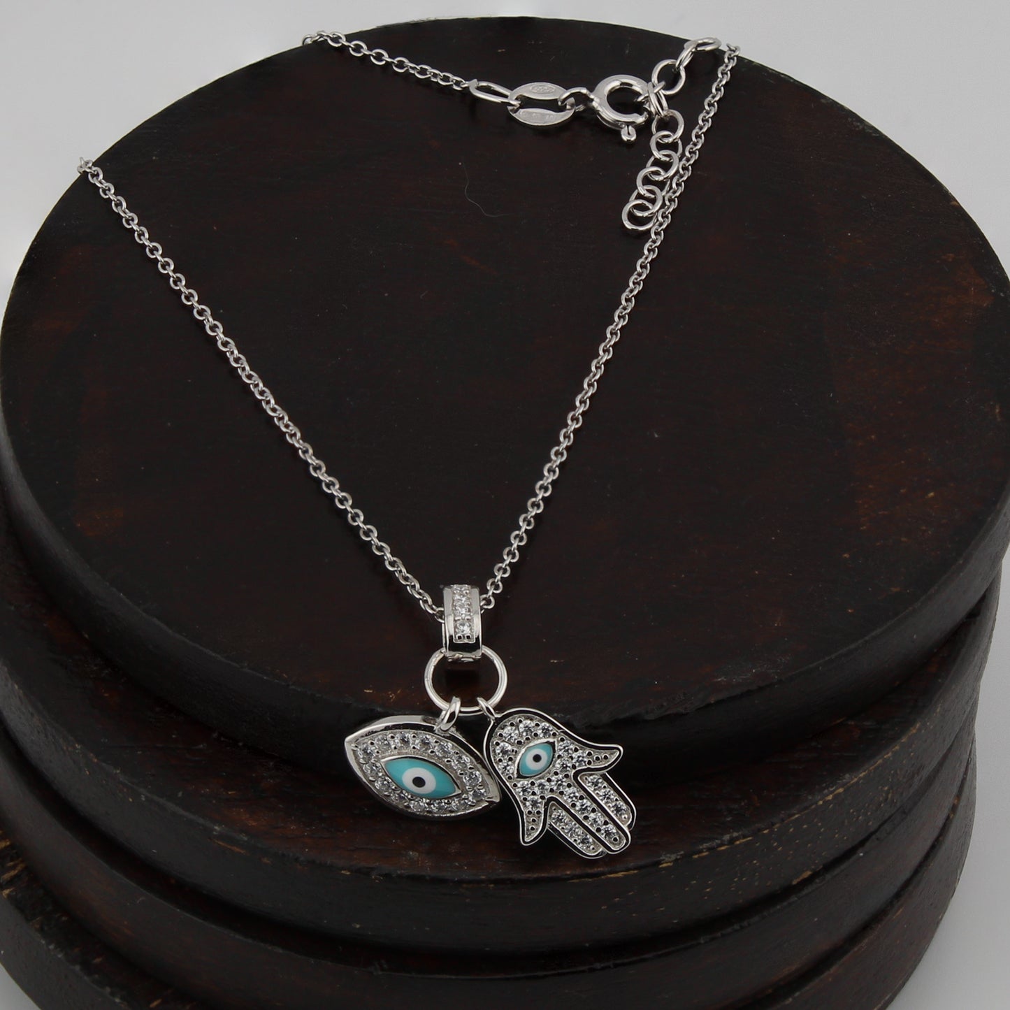 Collar con Colgante Mano de Fátima y Ojo Turco. Plata de Ley.  Baño Rodio. Zirconitas. Cadena Forzatina CL1314799R - Henor