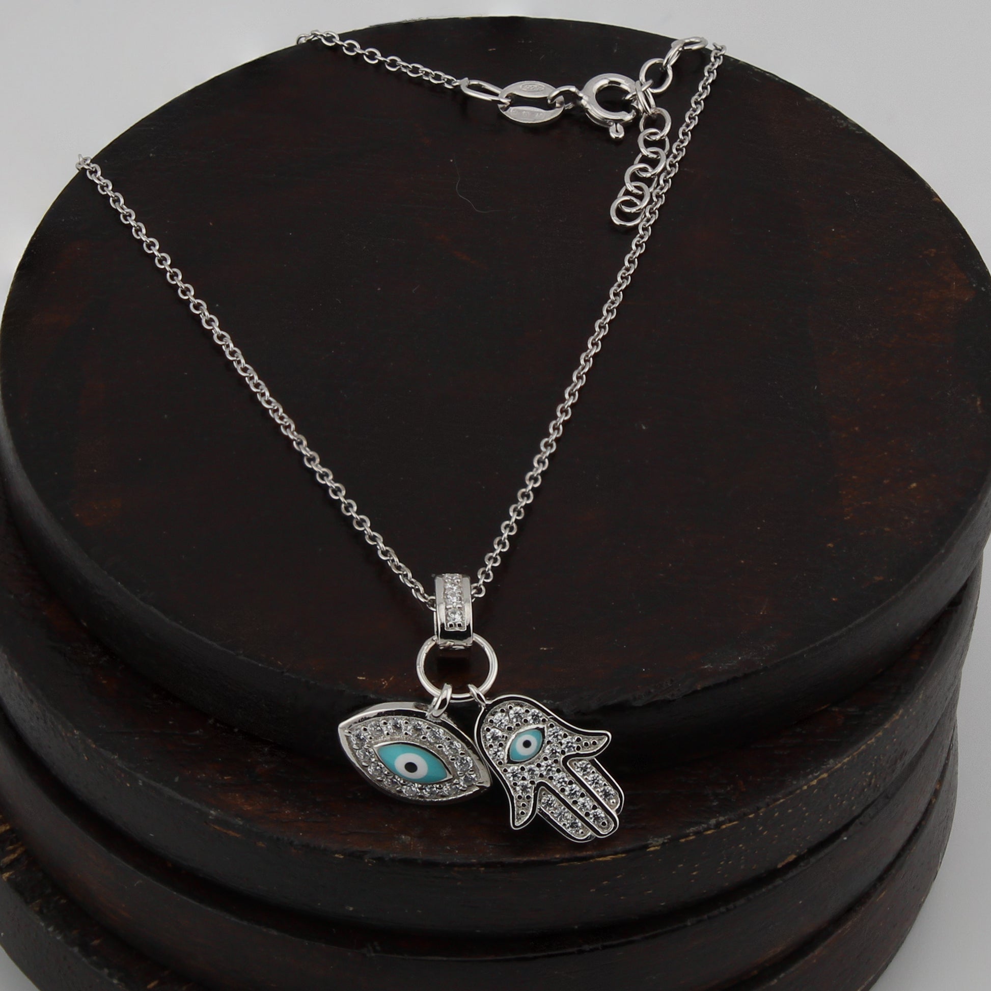 Collar con Colgante Mano de Fátima y Ojo Turco. Plata de Ley.  Baño Rodio. Zirconitas. Cadena Forzatina CL1314799R - Henor