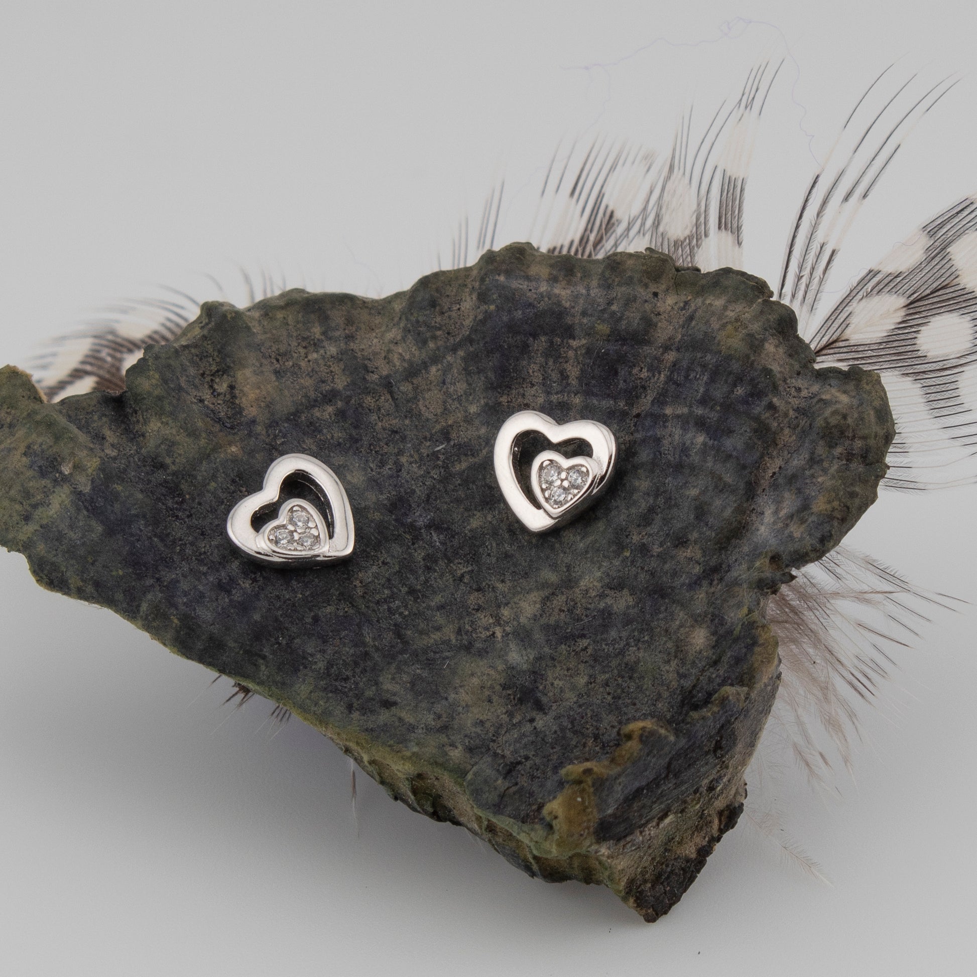 Pendientes doble corazón En fina Plata de Ley S925 con Baño Rodio y Zirconita PD2316473R - Henor