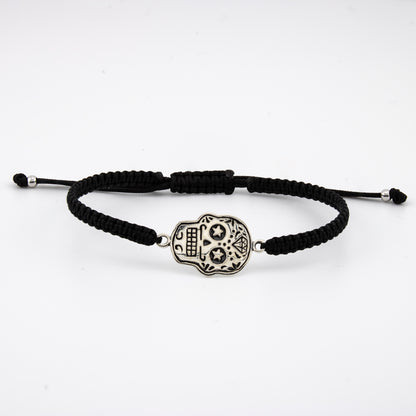 Bracciale Teschio in macramè nero e argento sterling S925 invecchiato. Lucidato a mano. PS3316459N